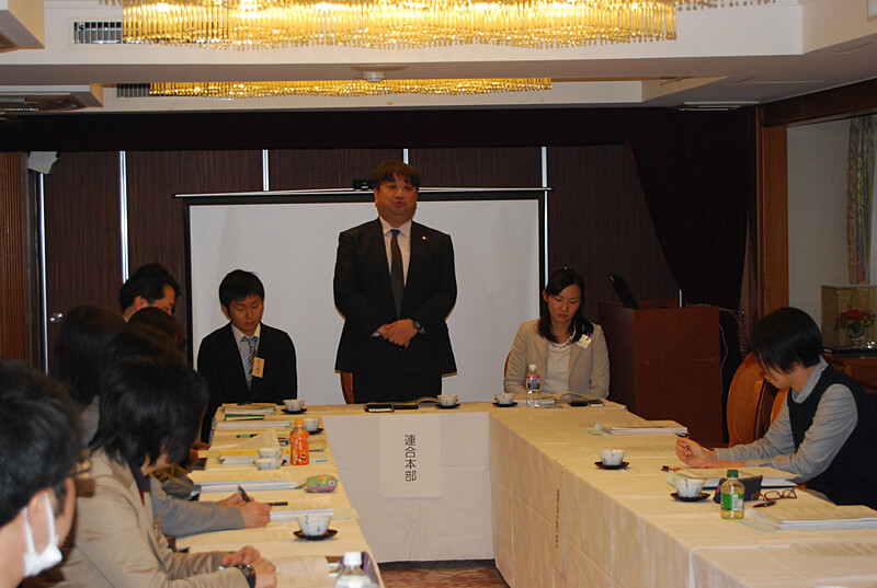 写真:藤井事務局長